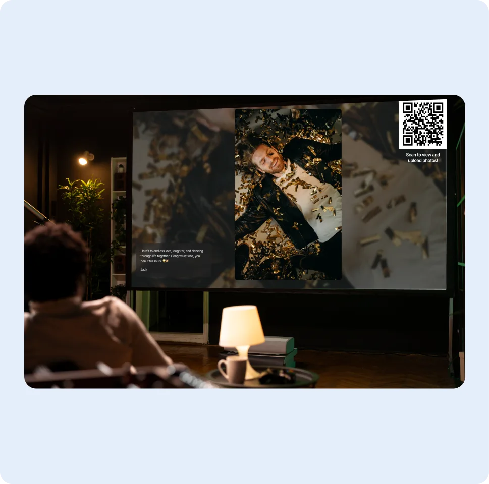 Party photos on a TV screen with the album QR code in the corner