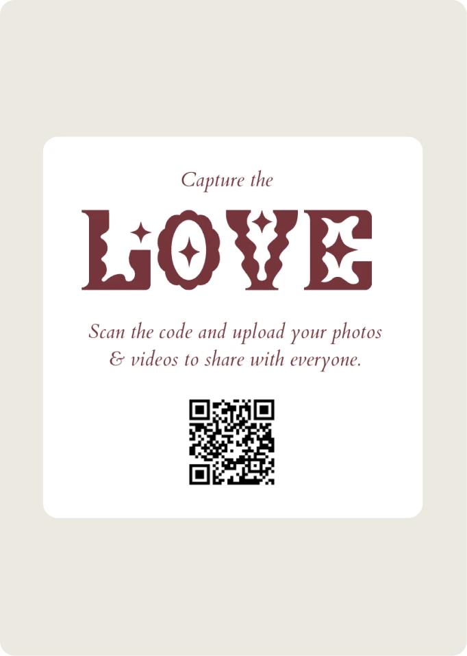 “Capture the love” wedding sign with a QR code and a line inviting guests to upload photos and videos